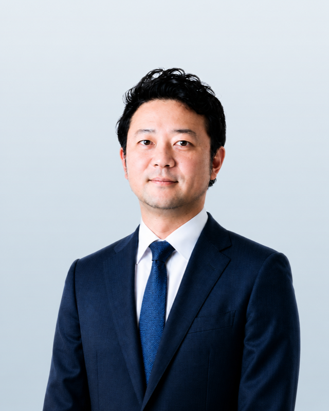 錦 拓男